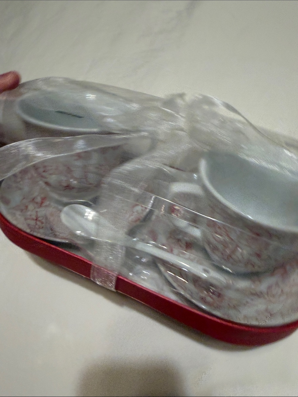 Red-Trim Porcelain Mug Set with Snowflake Pattern
